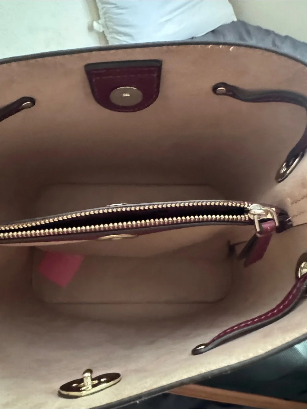 Kate Spade Marti Pebbled Leather Medium Bucket Bag in Deep Berry.